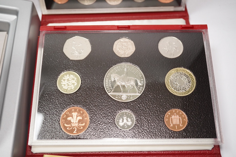 British coins, QEII, Royal Mint, seven UK proof coins sets, deluxe 1997-1999 and 2001-2003 and executive 2000